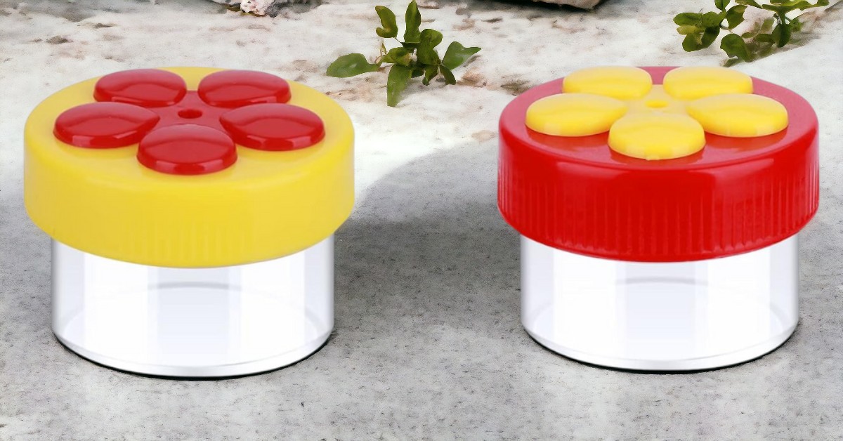two plastic Mini Flower Handheld Hummingbird Feeder with red and yellow lids